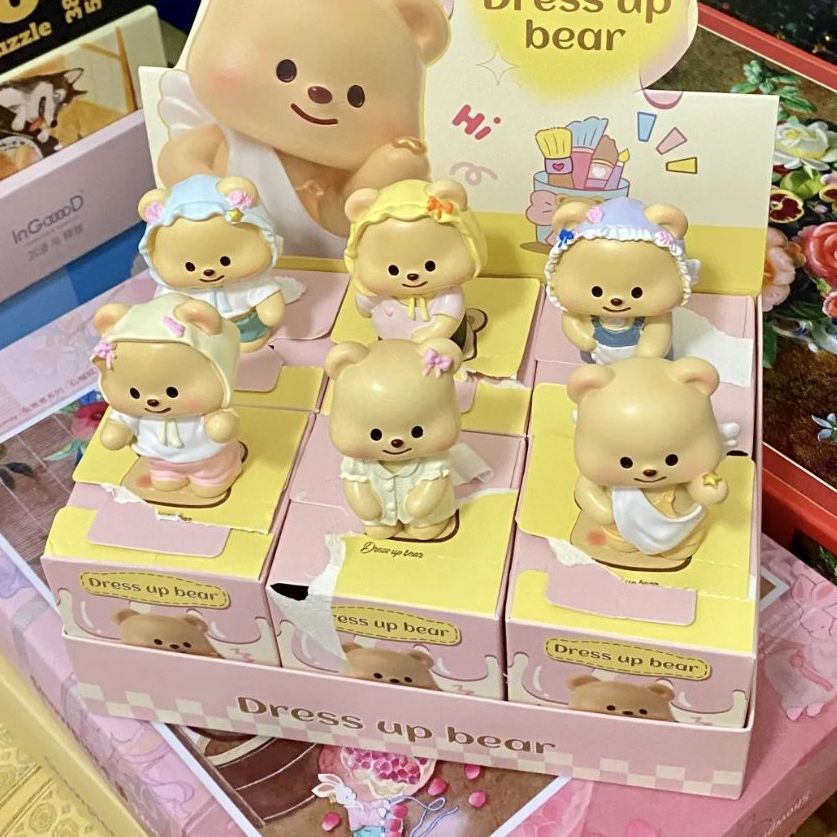 Dress up bear figurine
