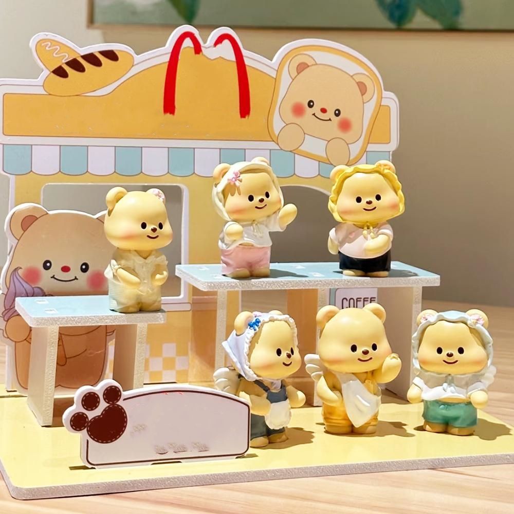 Dress up bear figurine
